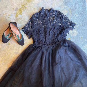 Black crocheted lace and tulle dress